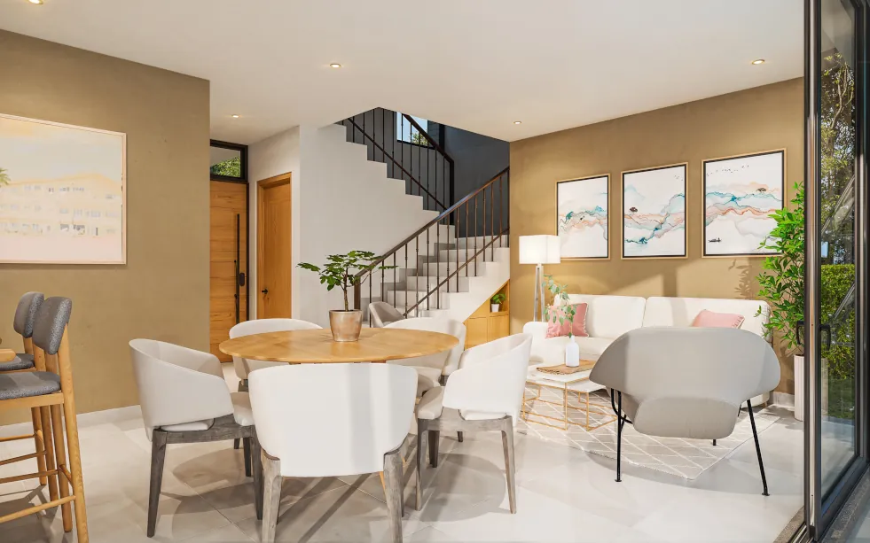 View of the living and dining room of a two-story home in La Guacima de Alajuela, located in Ciudad-Hacienda Los Reyes.