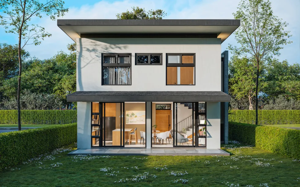 Rear view of a two-story home in La Guacima de Alajuela, located in Ciudad-Hacienda Los Reyes, where you can see a beautiful terrace and a large patio.